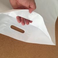 Белые пакеты с вырубной ручкой